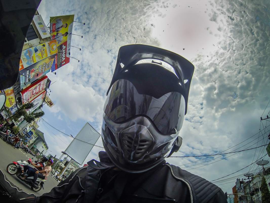 GoPro selfie shot from adventure bike rider in Indonesia 