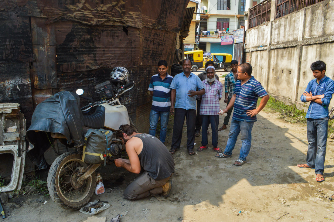Adventure bike repair on an Indian roadside